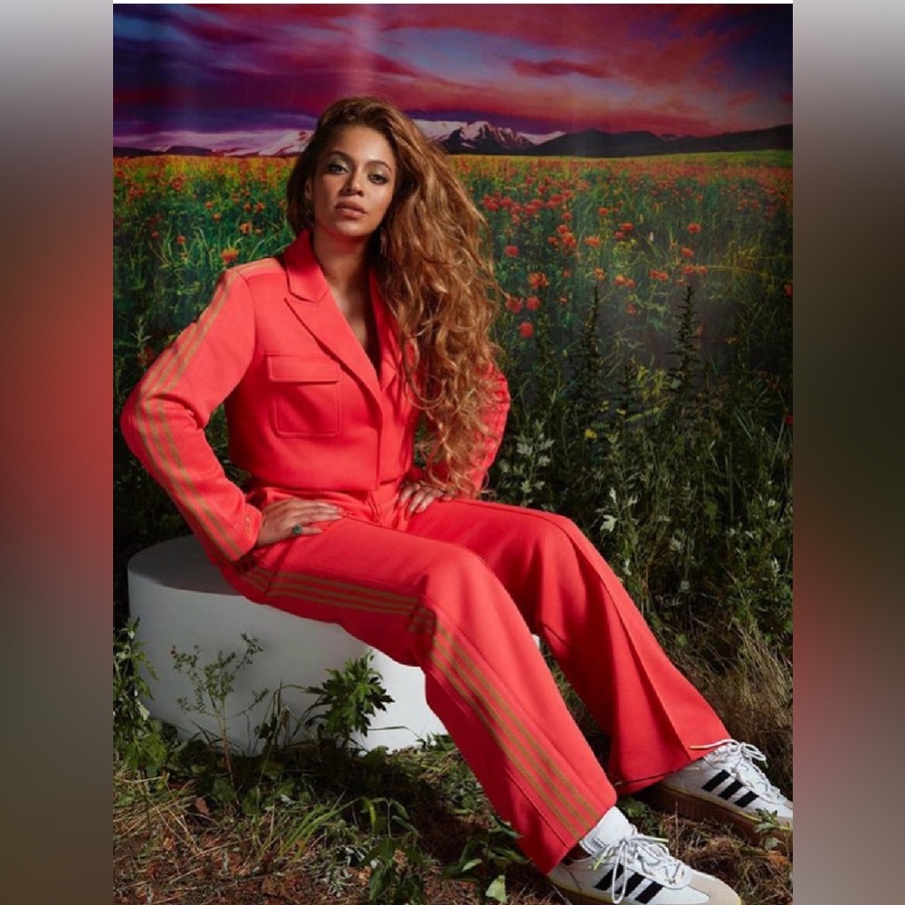 Adidas x IVY PARK Suit Pants in the vibrant Real Coralwith bronze 3 stripes